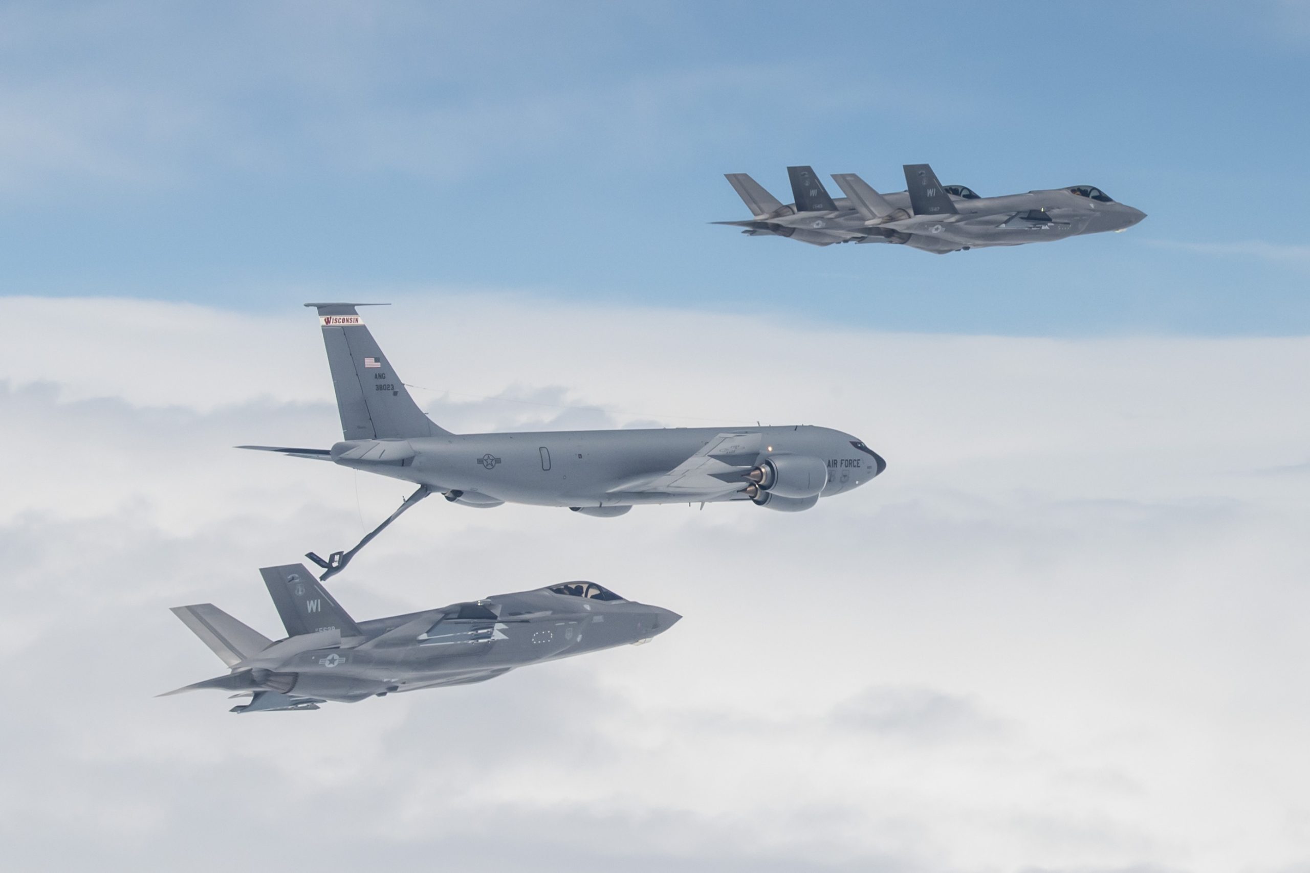 F-35 Lightning II aircraft assigned to the 115th Fighter Wing, Truax Field, Madison, Wisconsin receive fuel from a KC-135 Stratotanker assigned to the 128th Air Refueling Wing in Milwaukee during their initial flight to Truax Field April 25, 2023. This aerial refueling marks the first time the Wisconsin Air National Guard units have refueled together with the Wisconsin based fifth-generation fighter. (U.S. Air National Guard photo by Staff Sgt. Cameron Lewis)