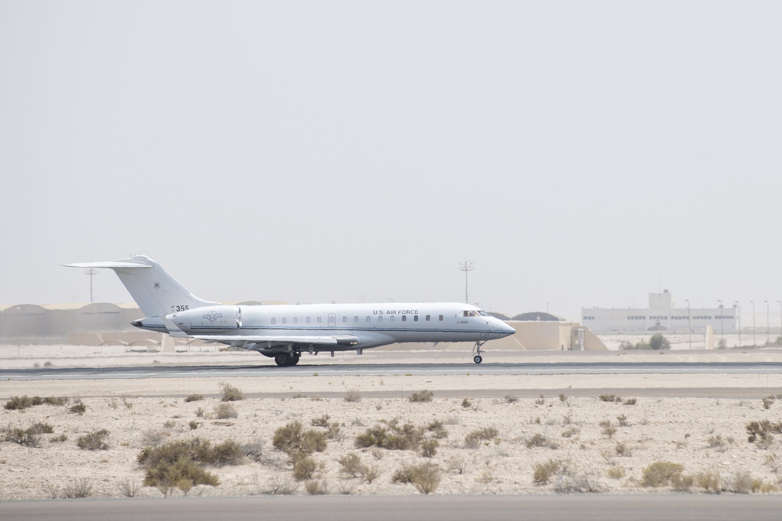 A U.S. Air Force E-11A Battlefield Airborne Communications Node aircraft, assigned to the 430th Expeditionary Electronic Combat Squadron, takes off in support of a joint, multi-national exercise at Al Dhafra Air Base (ADAB), United Arab Emirates, June 30, 2021. During the exercises, multiple platforms worked together to execute and refine tactics, techniques and procedures to counter Unmanned Aerial System threats. Conducting consistent training with partner nations ensures interoperability and the ability to defend ourselves, and reinforces security and stability in the region. (U.S. Air Force photo by Master Sgt. Wolfram M. Stumpf)