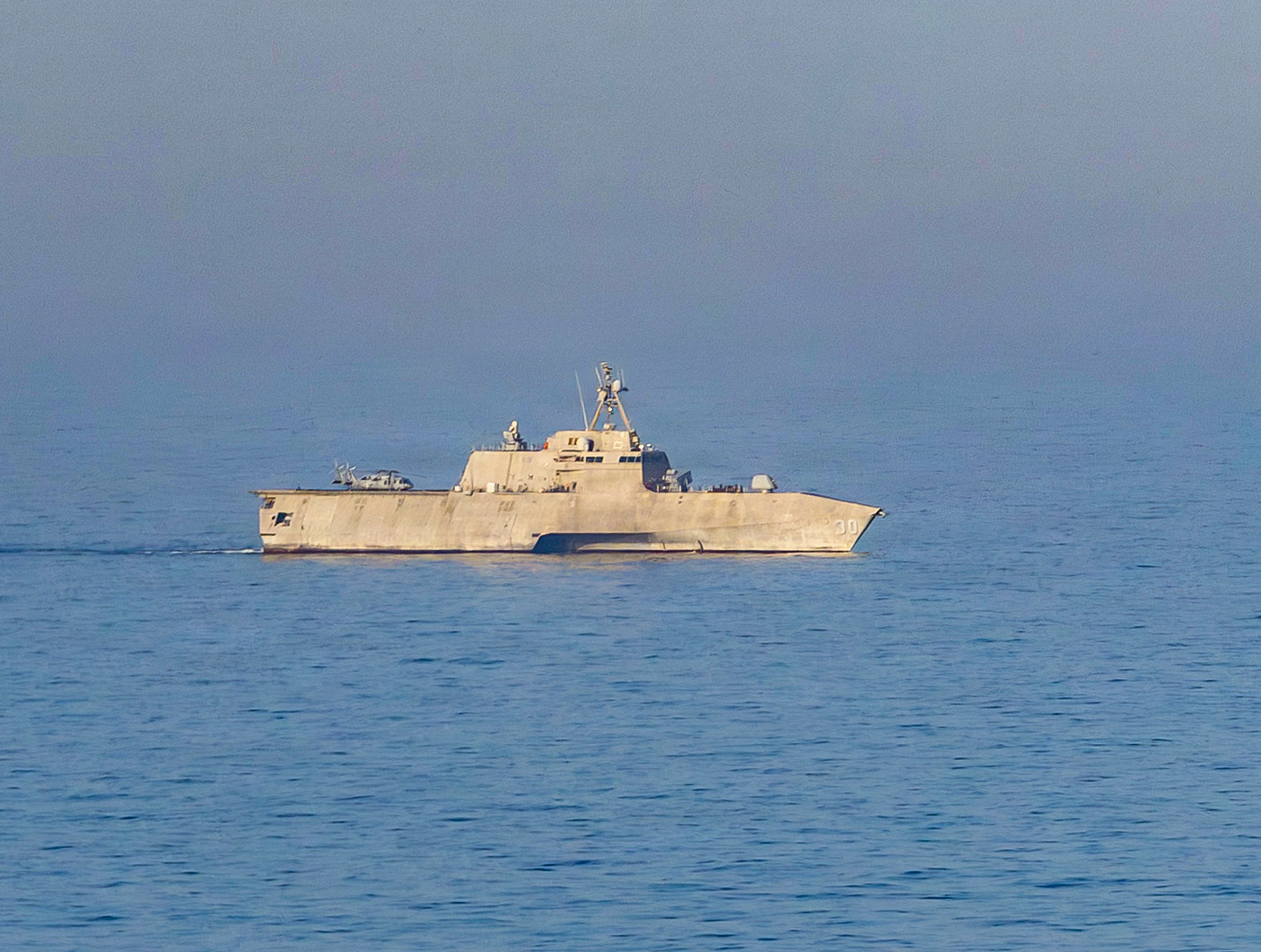 The Independence-class littoral combat ship USS Canberra (LCS 30) patrols the Arabian Sea during a maritime blockade against ships entering or exiting Iranian ports and coastal areas, April 17, 2026. (U.S. Navy photo)