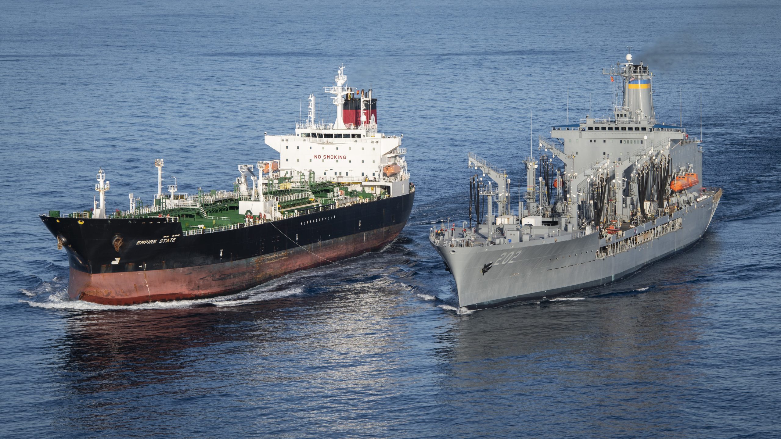 191028-N-LQ653-1474 PACIFIC OCEAN (Oct. 28, 2019) Henry J. Kaiser-class underway replenishment oiler USNS Yukon (T-AO-202, right, prepares to conduct a consolidated loading with commercial tanker MT Empire State. The evolution provided the Military Sealift Command (MSC) Pacific Commander the opportunity to exercise a training opportunity at sea with the two ships. (U.S. Navy photo by Mass Communication Specialist 1st Class Patrick W. Menah Jr./Released)