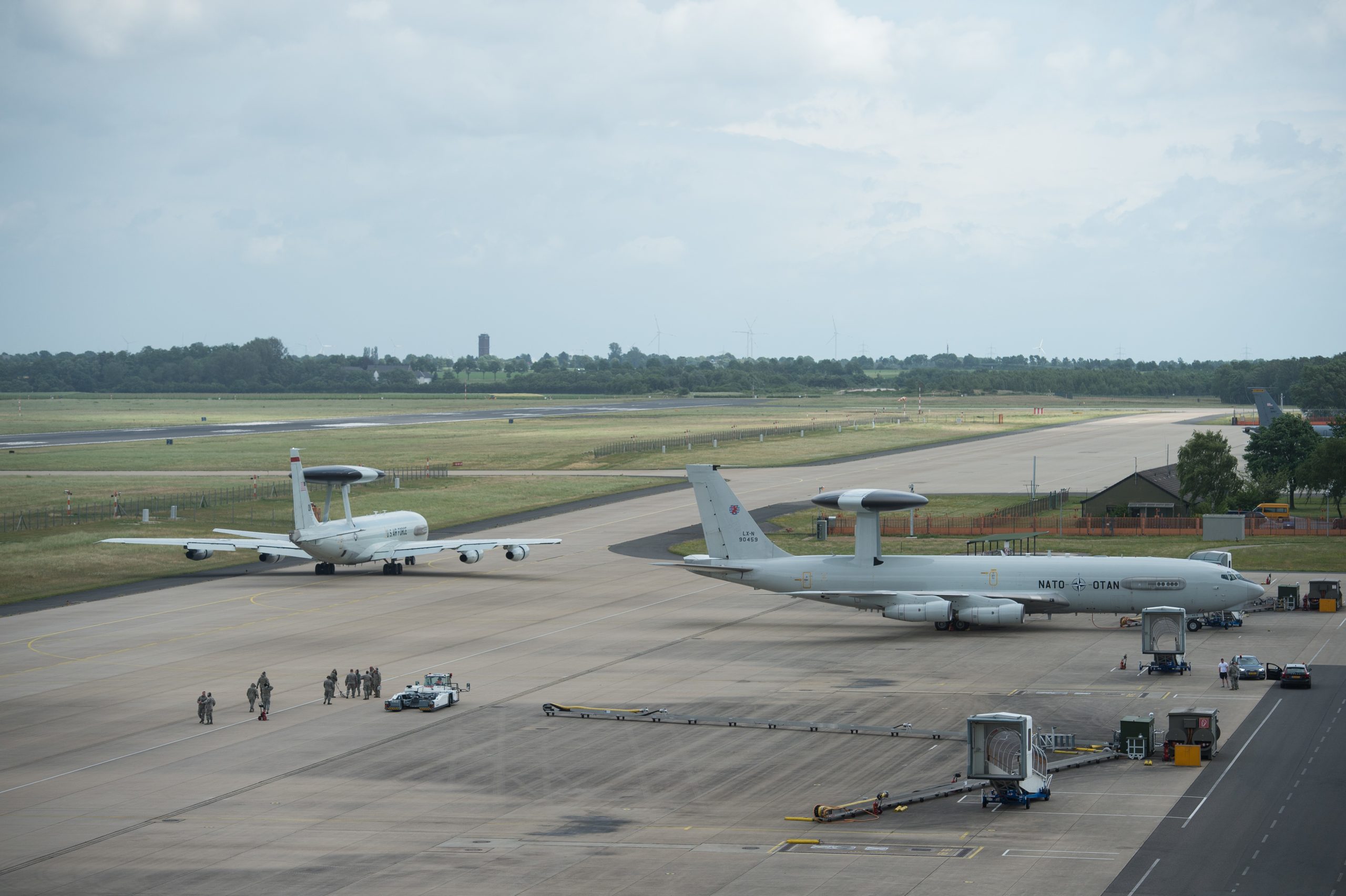 A U.S Air Force E-3 Sentry taxis past a NATO E-3A Airborne Warning and Control System aircraft on June 7, 2017, at NATO Air Base Geilenkirchen, Germany. The aircraft and nearly 100 reservists from the 513th Air Control Group are deployed in support of BALTOPS 2017, which is the first time a U.S. E-3 Sentry has supported a NATO exercise in 20 years. (U.S. Air Force photo/2nd Lt. Caleb Wanzer)