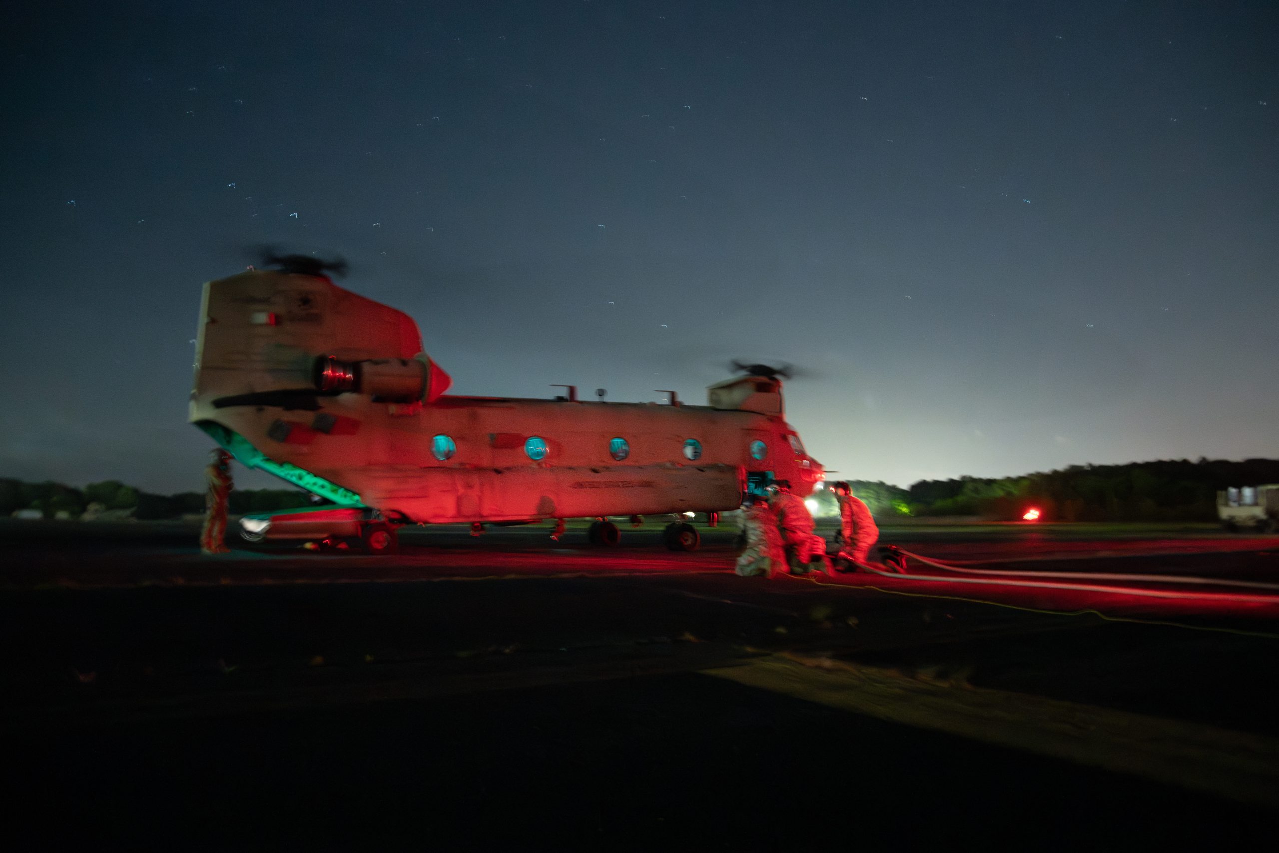 JOINT BASE LANGLEY- EUSTIS, Va. – U.S. Soldiers assigned to Echo Company, 5-159th General Support Aviation Battalion (GSAB), refuel a CH-47 Chinook helicopter during a Forward Arming and Refueling Point (FARP) training at Felker Army Airfield on Joint Base Langley-Eustis, Virginia, April 25, 2024. FARP training enables soldiers to gain experience providing fuel and ordinance necessary for rotary wing operations. (U.S. Air Force photo by Zulema Sotelo)