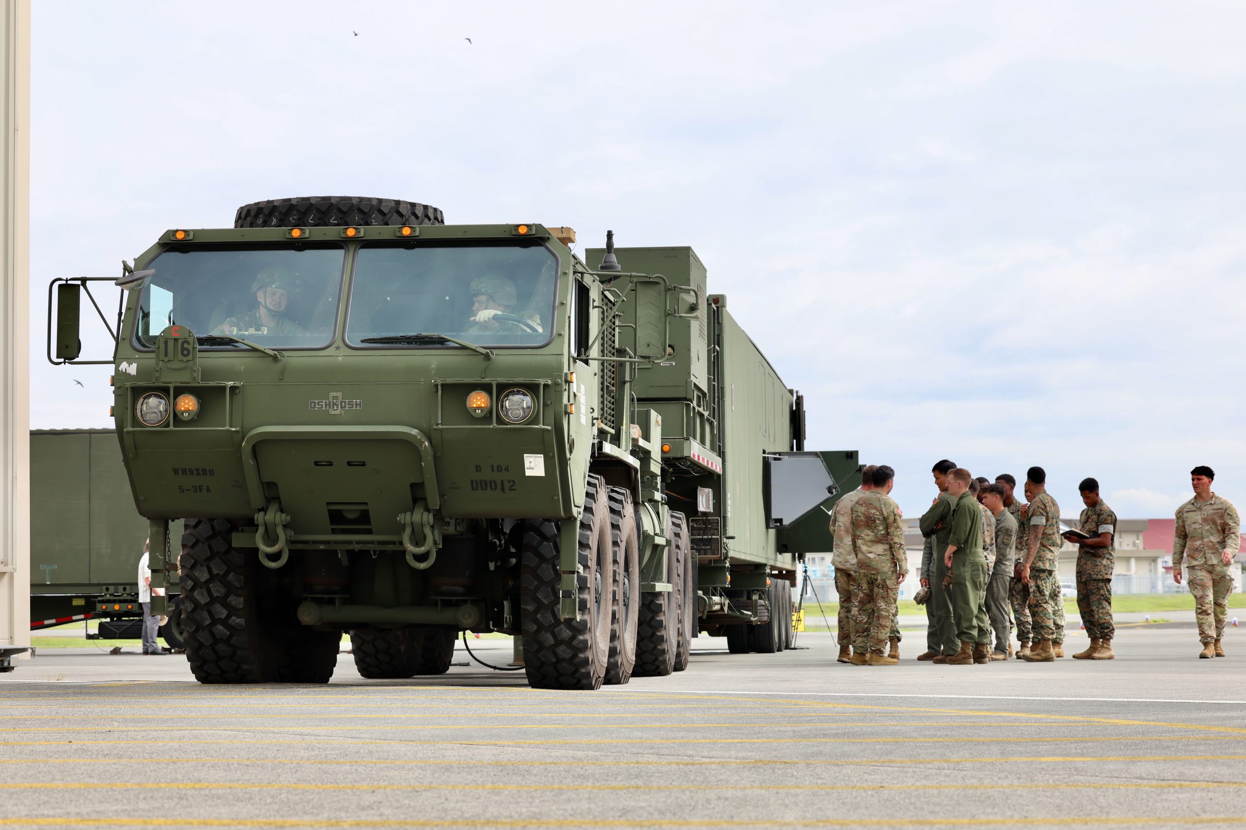 U.S. Marines and Sailors observe and familiarize themselves with the U.S. Army’s Typhon missile system during a training opportunity at Marine Corps Air Station Iwakuni, Japan, Sept. 12, 2025. The hands-on session allowed personnel from various units to learn about the system’s capabilities as part of Resolute Dragon 25, an annual bilateral exercise across Japan, including the Southwest Islands, that strengthens the command, control and multi-domain maneuver capabilities of the III Marine Expeditionary Force and the Japan Ground Self-Defense Force’s Western Army personnel with a focus on controlling and defending key maritime terrain. (U.S. Army photo by Sgt. Perla Alfaro)