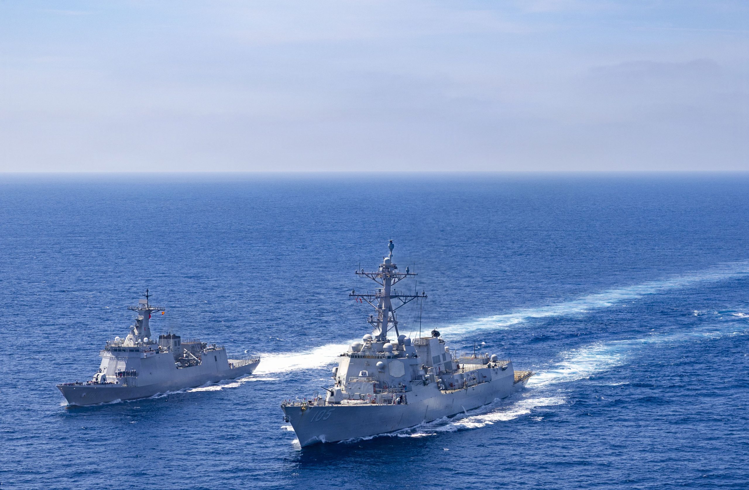 Philippine Navy Jose Rizal-class guided-missile frigate BRP Antonio Luna (FF 151), left, steams alongside U.S. Navy Arleigh Burke-class missile-guided destroyer USS Dewey (DDG 105), right, while conducting a replenishment-at-sea exercise in the South China Sea during the multilateral Maritime Cooperative Activity (MCA) alongside Japan and the Philippines in the Philippines’ Exclusive Economic Zone, Feb. 25, 2026. The U.S. Navy routinely operates with the Armed Forces of the Philippines and partners and allies through MCAs to continually develop, exercise and enhance multi-domain tactical interoperability to uphold peace and security in the region. Dewey is forward-deployed and assigned to Destroyer Squadron (DESRON) 15, the Navy’s largest DESRON and the U.S. 7th Fleet’s principal surface force. (U.S. Navy photo by Mass Communication Specialist 2nd Class Oscar Diaz)