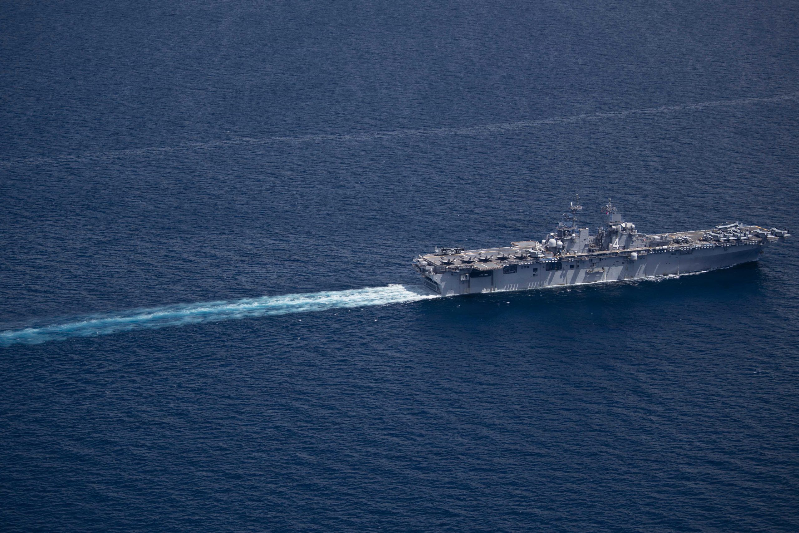 Wasp-class amphibious assault ship USS Boxer (LHD 4) transits the Sulu Sea, April 26, 2026. Boxer, flagship of the Boxer Amphibious Ready Group, is underway with the 11th Marine Expeditionary Unit in the U.S. 7th Fleet area of operations. U.S. 7th Fleet, the Navy’s largest forward-deployed numbered fleet, routinely interacts and operates with allies and partners to preserve a free and open Indo-Pacific. (U.S. Navy photo by Mass Communication Specialist Seaman Apprentice Sailor O’Rear)