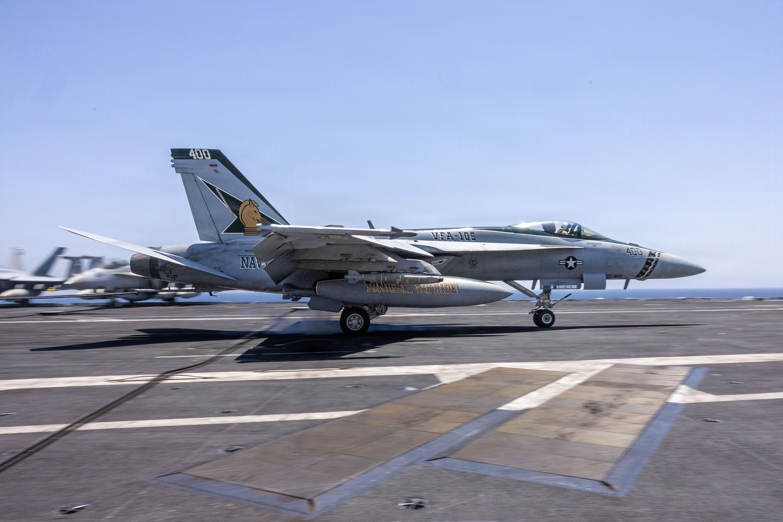 An F/A-18E Super Hornet lands on the flight deck aboard Nimitz-class aircraft carrier USS George H.W. Bush (CVN 77), April 27, 2026. George H.W. Bush is deployed to the U.S. 5th Fleet area of operations to support maritime security and stability in the Middle East. (U.S. Navy photo)