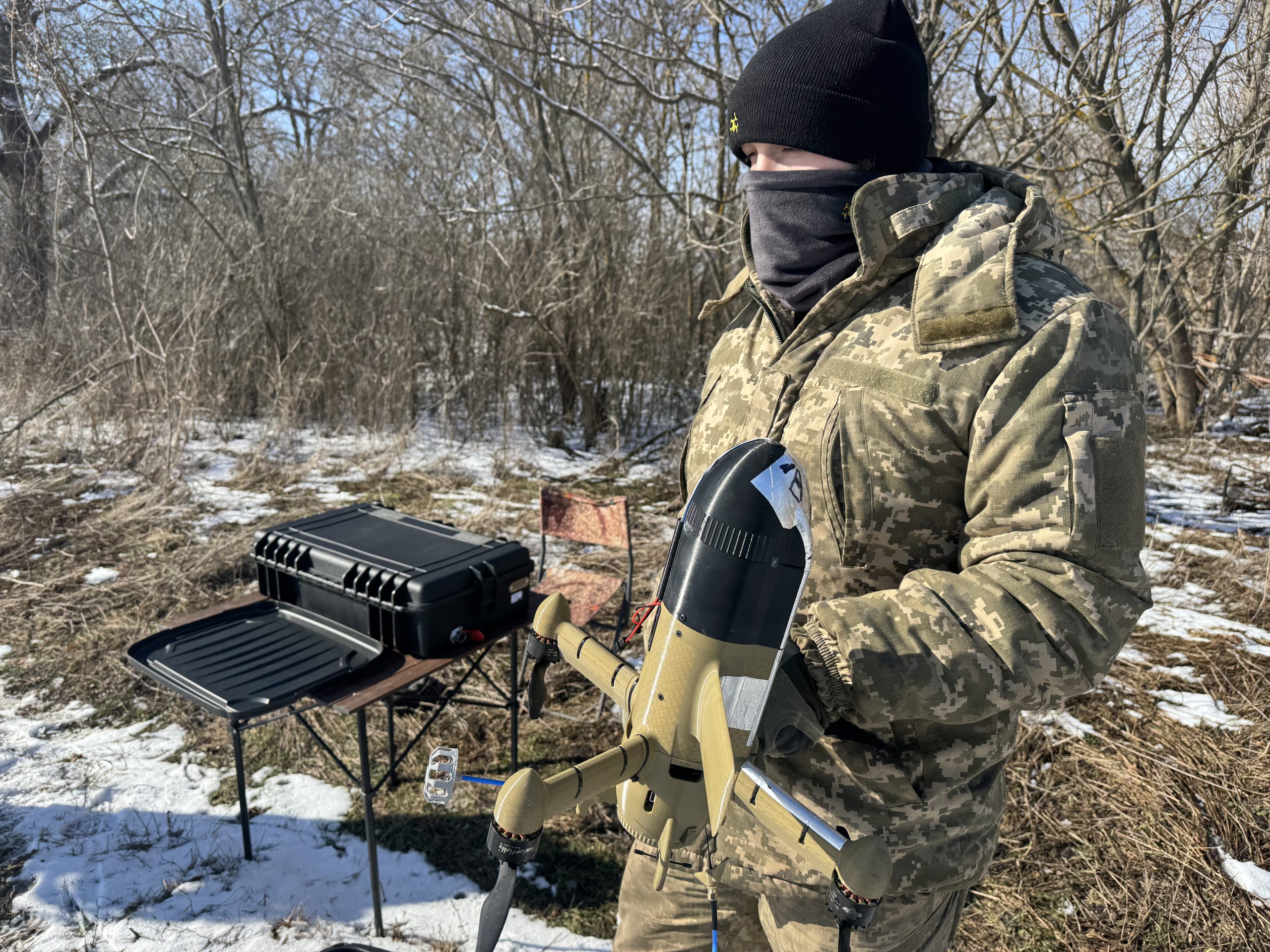 DNIPROPETROVSK OBLAST, UKRAINE - FEBRUARY 22: Ukrainian soldier holds interceptor drone Sting before a test flight on February 22, 2026 in Dnipropetrovsk Oblast, Ukraine. With the help of interceptor drones, the Ukrainian army shoots down Shaheds and Gerbers drones, which the Russian army launches over Ukraine. Interceptor drone can reach speeds of up to 300 kilometers and hit an air target at an altitude of 3 kilometers. The interceptor can be controlled using VR glasses or a small ground station. (Photo by Alex Nikitenko/Global Images Ukraine via Getty Images)