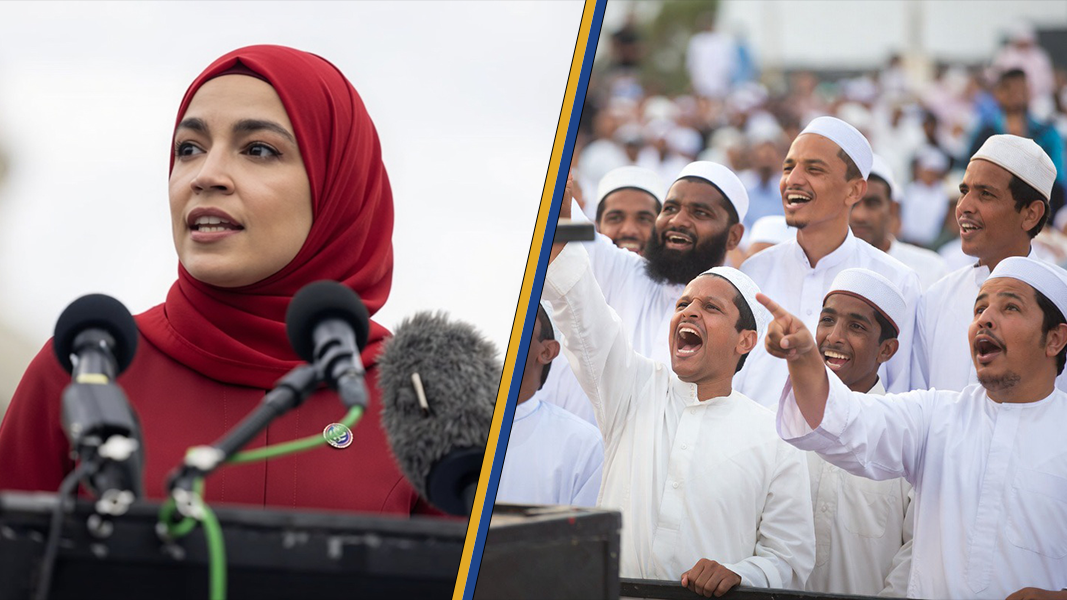 A woman in a red hijab speaks at a podium while an enthusiastic crowd in white celebrates, showcasing diversity and engagement in a public event.