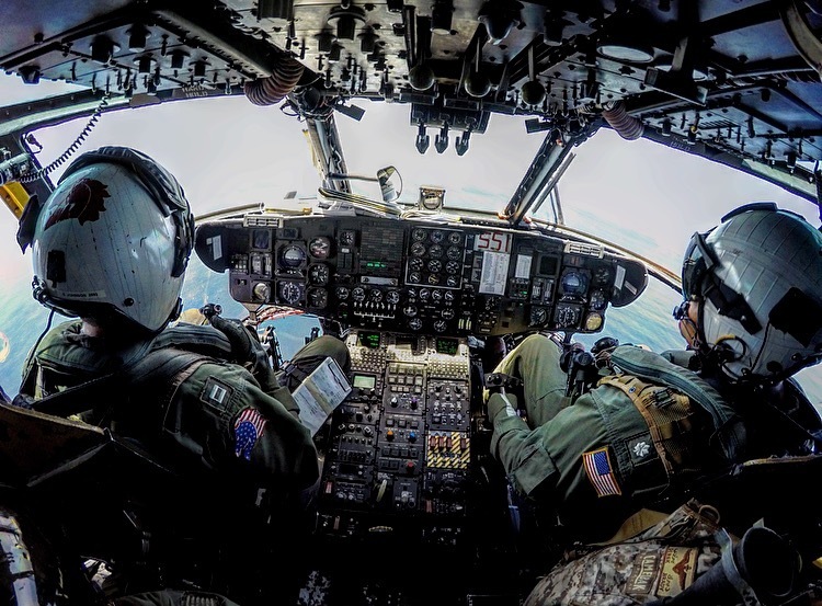 SAN DIEGO (July 21, 2016) - Lt. Sean Johnson, left, and Cmdr. Derek Brady, commanding officer of Helicopter Mine Countermeasures Squadron (HM) 14, right, pilots a MH-53E Sea Dragon out to amphibious dock landing ship USS Pearl Harbor (LSD 52) during the Southern California portion of Rim of the Pacific 2016. Twenty-six nations, more than 40 ships and submarines, more than 200 aircraft and 25,000 personnel are participating in RIMPAC from June 30 to Aug. 4, in and around the Hawaiian Islands and Southern California. The world's largest international maritime exercise, RIMPAC provides a unique training opportunity that helps participants foster and sustain the cooperative relationships that are critical to ensuring the safety of sea lanes and security on the world's oceans. RIMPAC 2016 is the 25th exercise in the series that began in 1971. (U.S. Navy photo Lt. Cmdr. Jeremy Braun/Released)