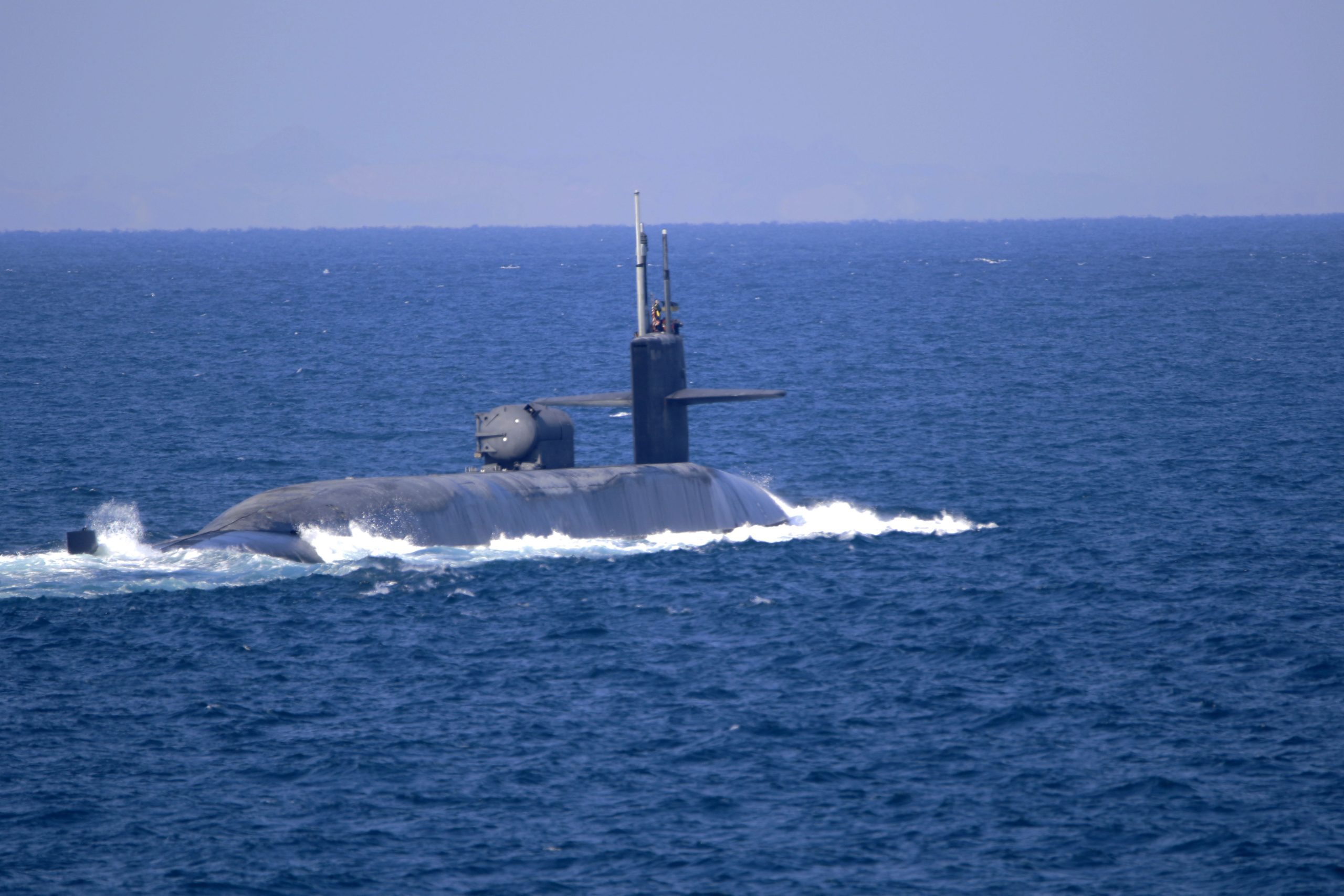 201221-N-IE405-4058 STRAIT OF HORMUZ (Dec. 21, 2020) The guided-missile submarine USS Georgia (SSGN 729) transits the Strait of Hormuz, Dec. 21. Georgia is deployed to the U.S. 5th Fleet area of operations in support of naval operations to ensure maritime stability and security in the Central Region, connecting the Mediterranean and Pacific through the Western Indian Ocean and three critical chokepoints to the free flow of global commerce. (U.S. Navy photo by Mass Communication Specialist 2nd Class Indra Beaufort/Release)
