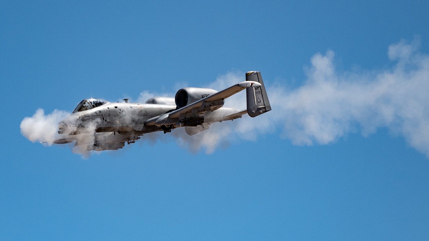 An A-10 Thunderbolt II fires its GAU-8 Avenger 30mm Gatling gun at the Barry M. Goldwater Range near Gila Bend, Ariz., as part of the close air support competition during Hawgsmoke 2024 on Sept. 13, 2024. The A-10, known for its iconic role in protecting ground forces, continues to demonstrate its relevance in modern combat. (U.S. Air Force photo by Tech. Sgt. Tyler J. Bolken)