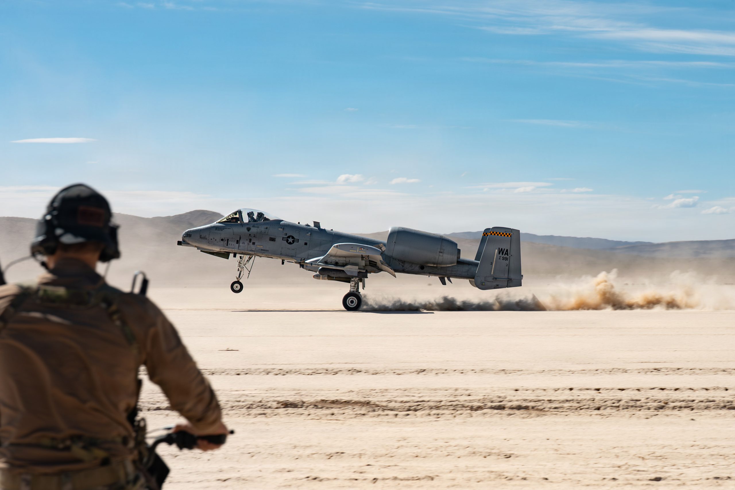 A U.S. Air Force A-10 Thunderbolt II aircraft assigned to the 66th Weapons Squadron, U.S. Air Force Weapons School, performs an austere landing at Delamar Dry Lake near Alamo, Nevada, May 28, 2026. The 66th WPS provided close air support and forward air control during a Weapons School Integration mission. (U.S. Air Force photo by Airman 1st Class Jennifer Nesbitt)