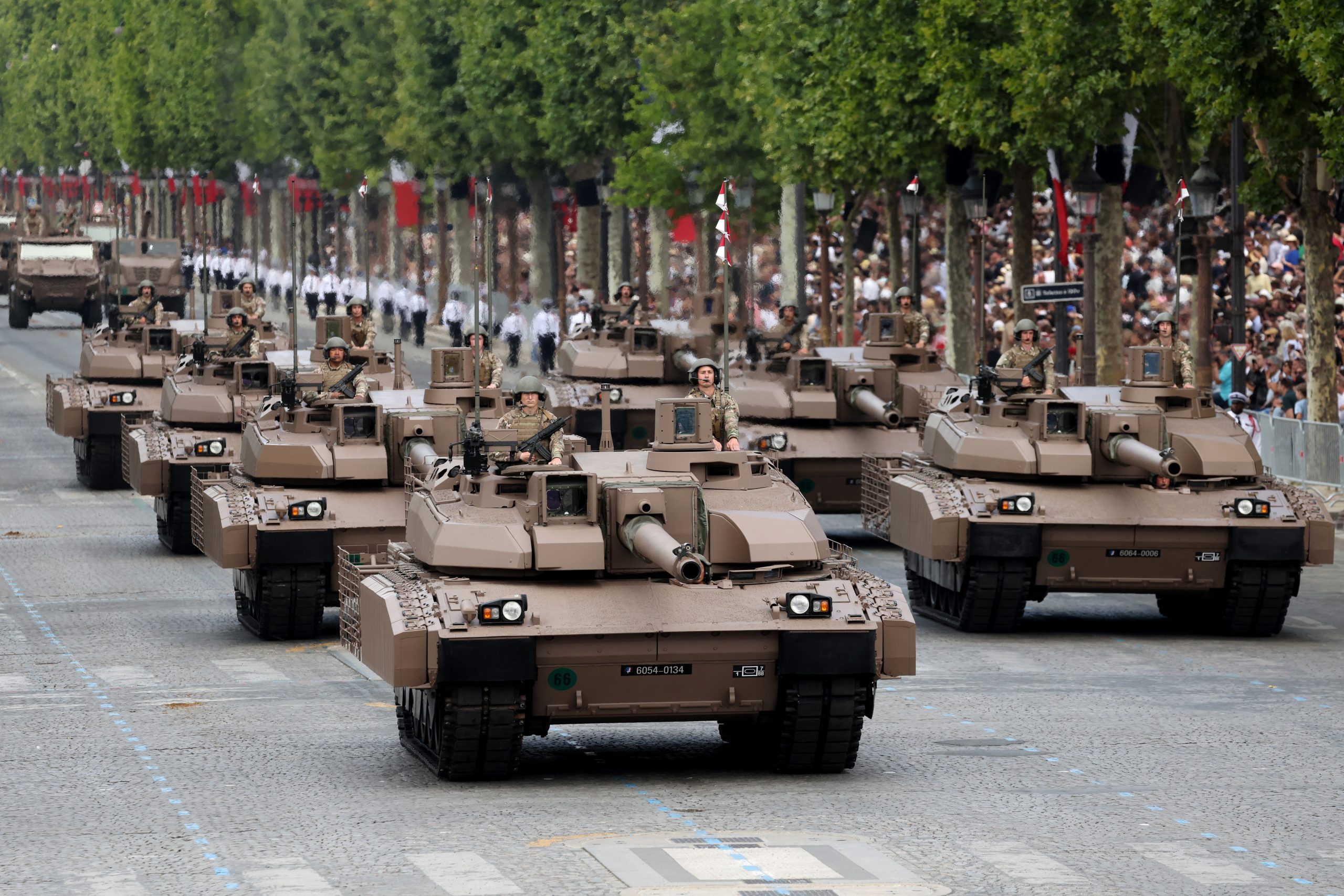 French Army Chars Leclerc XLR tanks are navigated to parade during the annual Bastille Day military parade on the Champs-Elysees Avenue in Paris on July 14, 2025. (Photo by Ludovic MARIN / AFP) (Photo by LUDOVIC MARIN/AFP via Getty Images)