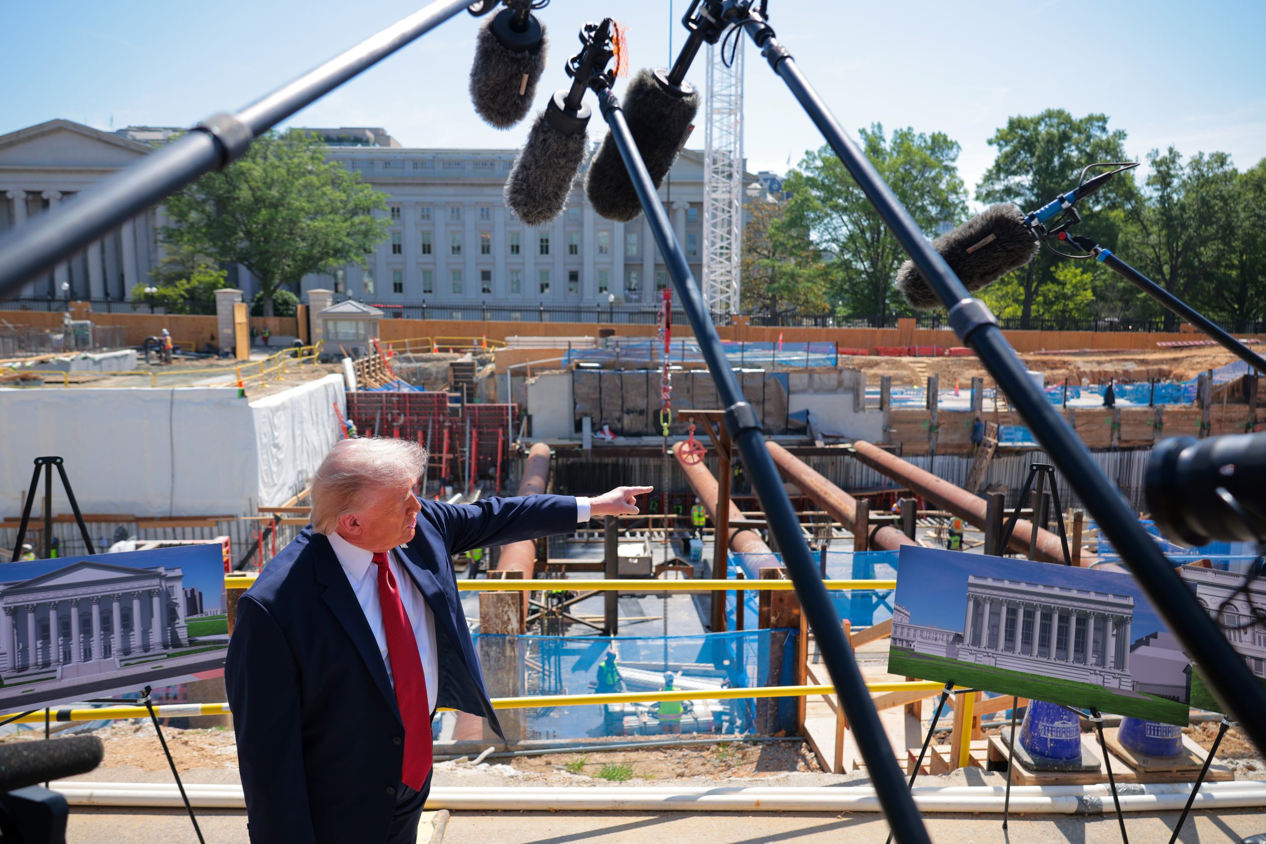 WASHINGTON, DC - MAY 19: U.S. President Donald Trump speaks to the media alongside posters of his proposed White House ballroom amid construction at the White House on May 19, 2026 in Washington, DC. The Senate parliamentarian ruled this week that taxpayer funds in the budget reconciliation package cannot be used for a $1 billion provision intended to fund security for Trump’s White House ballroom. (Photo by Chip Somodevilla/Getty Images)