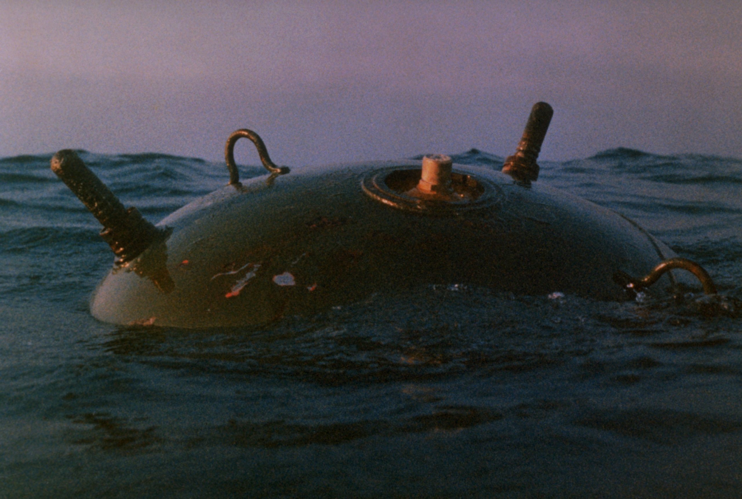 An Iraqi mine floats in the waters of the Persian gulf. Over 1,275 such mines were discovered in the gulf during Operation Desert Storm. (Photo by © CORBIS/Corbis via Getty Images)