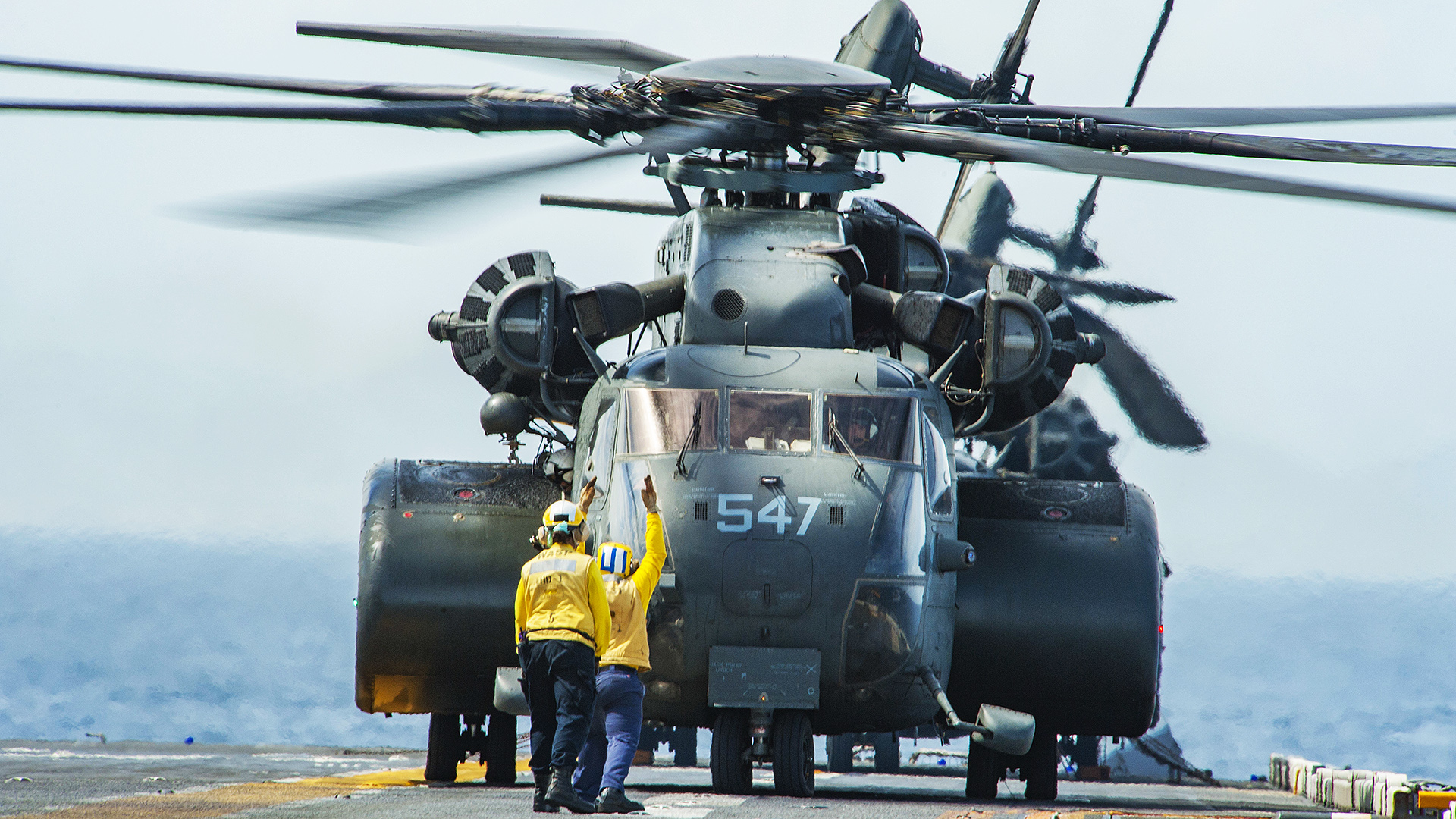 MH-53E Sea Dragon on an amphibious assault ship deck.