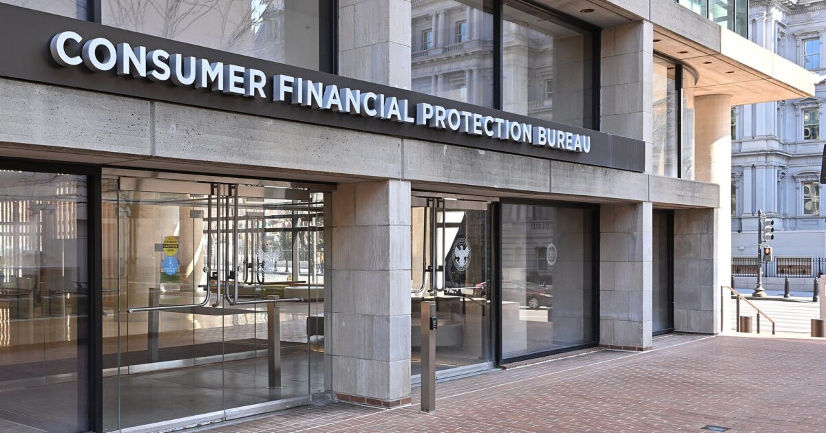 Exterior view of the Consumer Financial Protection Bureau building featuring modern architecture and large glass windows.