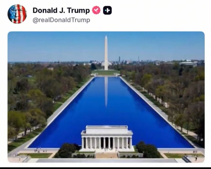 Aerial view of the Lincoln Memorial and Washington Monument reflecting in the reflecting pool, surrounded by lush greenery in Washington, D.C.